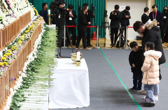 Heartbreaking Scenes At Jeju Air Plane Crash Memorial Altar In Muan