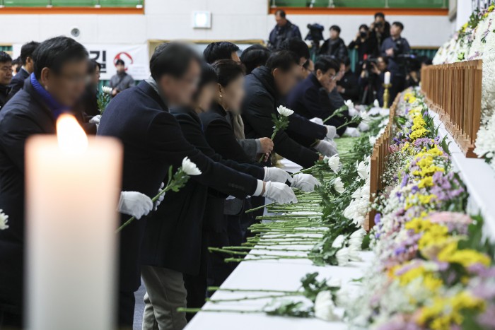 Heartbreaking Scenes At Jeju Air Plane Crash Memorial Altar In Muan