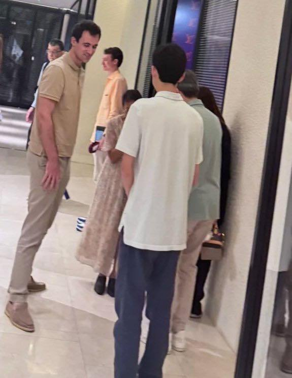 Earlier, Frédéric (in the yellow shirt) escorted Lisa throughout the event and was spotted meeting her parents.