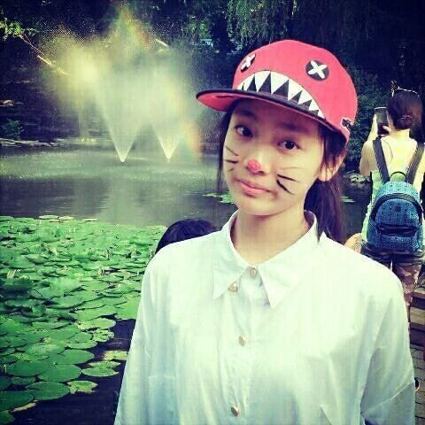 ningning plastic surgery rumorsportrait-fountain-catface-outdoors.