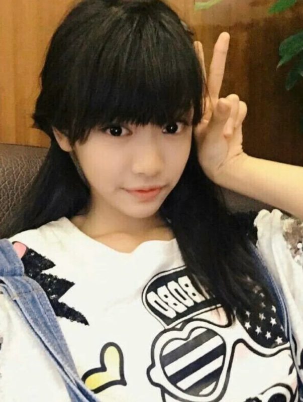 ningning plastic surgery rumorsportrait-bangs-peaceSign-tshirt.
