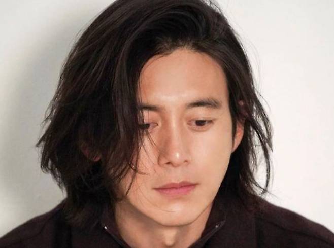 go soo marriage storyportrait-Asian-man-longhair.