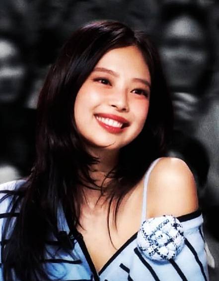 jennie layered cut hairstylewoman-smiling-brunette-stripedShirt.