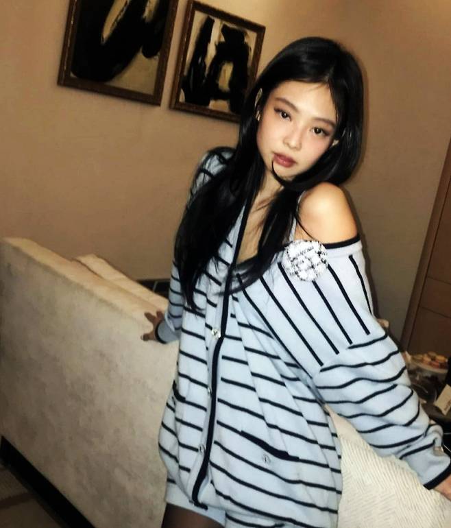 jennie layered cut hairstylewoman-portrait-striped-jacket.