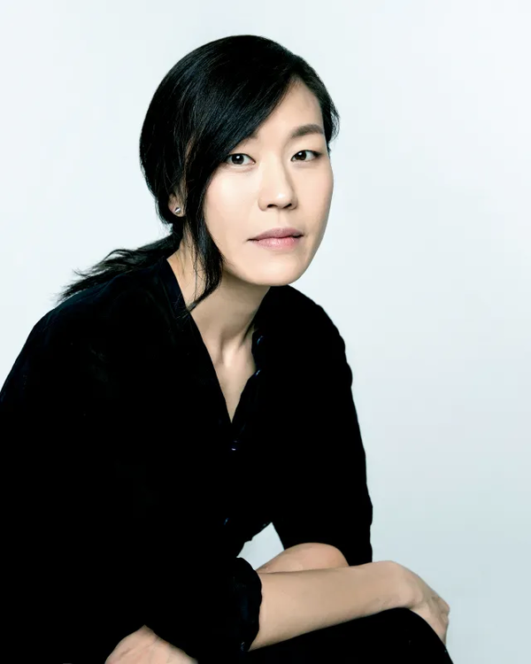 lee bo-young joins hybewoman-blackshirt-portrait-serious.