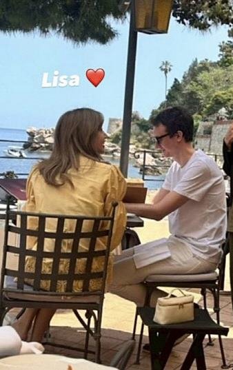 blackpink lisa frédéric arnault datingcouple-outdoor-restaurant-ocean.