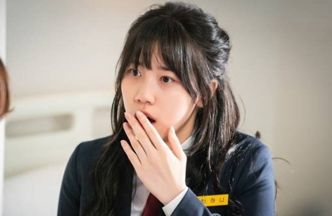 lee re actress educationshocked-Asian-uniform-handOnMouth.