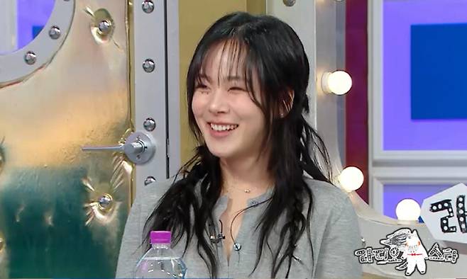 bibi radio star appearancewoman-smiling-braids-studio.