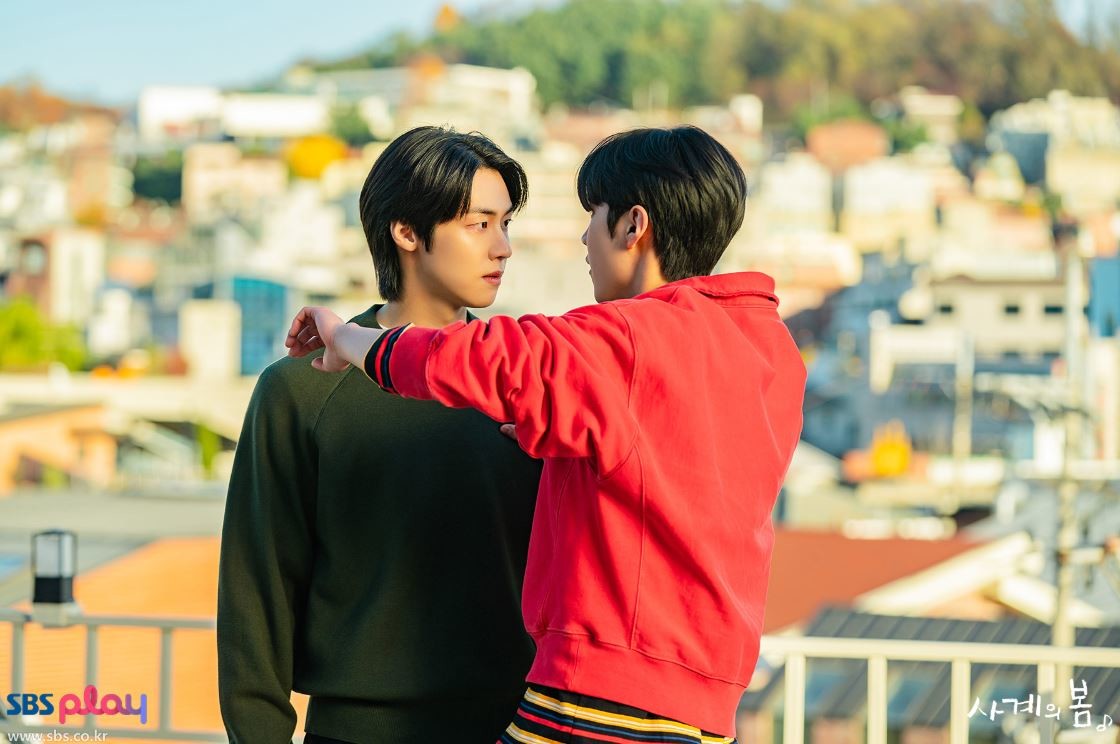 spring of youth global popularityTwoPeople-RedSweater-Rooftop-Staring.
