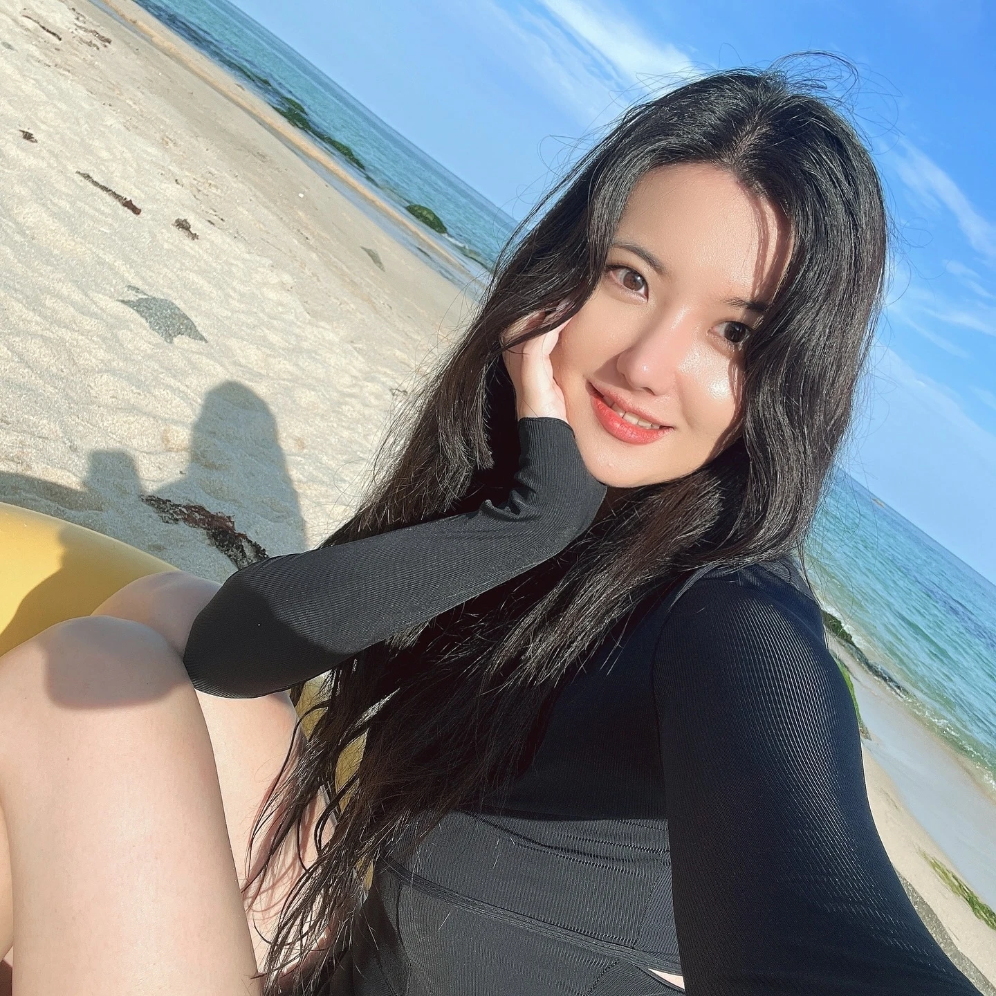 seoyeon together adult toy store ownerwoman-beach-smiling-blackswimsuit.