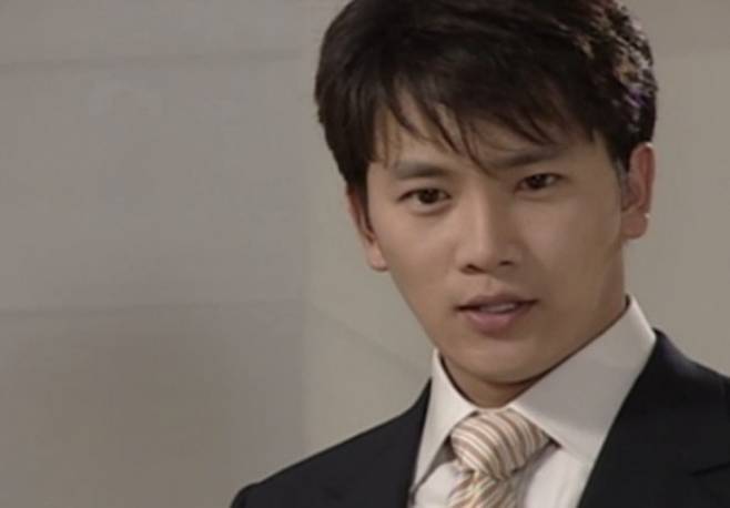 Ji Sung success storyman-suit-tie-portrait.