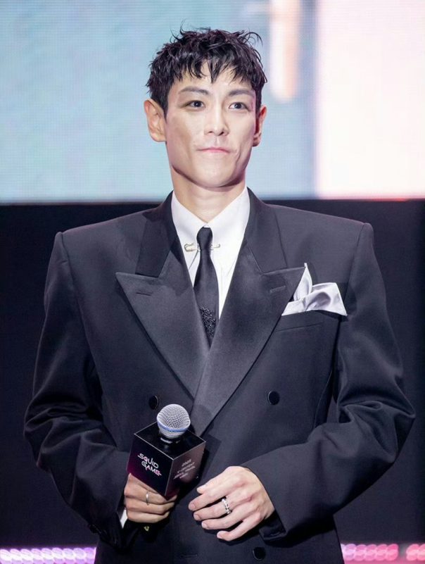T.O.P Squid Game 3 appearanceMan-Suit-Microphone-Elegant.