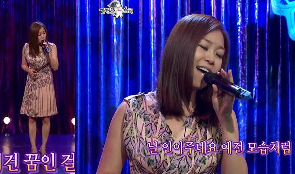 Lena Park vocal cord cystsinger-microphone-stage-performance.