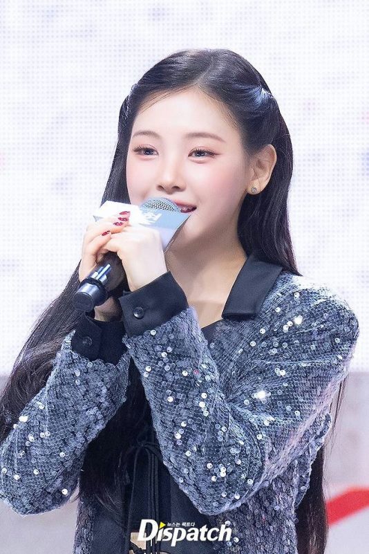 baby dont cry debut controversyWoman-Microphone-Sequins-Smiling.