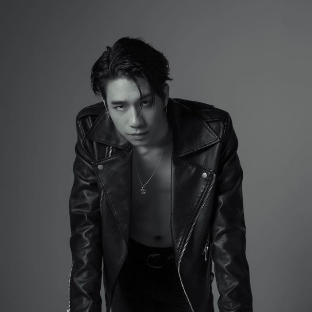 prom ratchapa sexual misconductman-leatherjacket-necklace-blackandwhite.