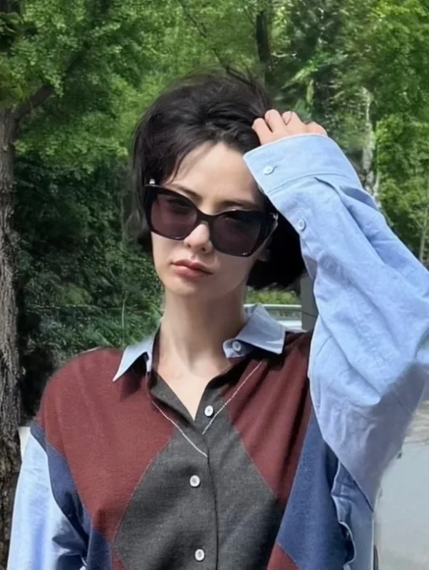Nana Rocks No-Bra Look with Fading Full-Body Tattoo