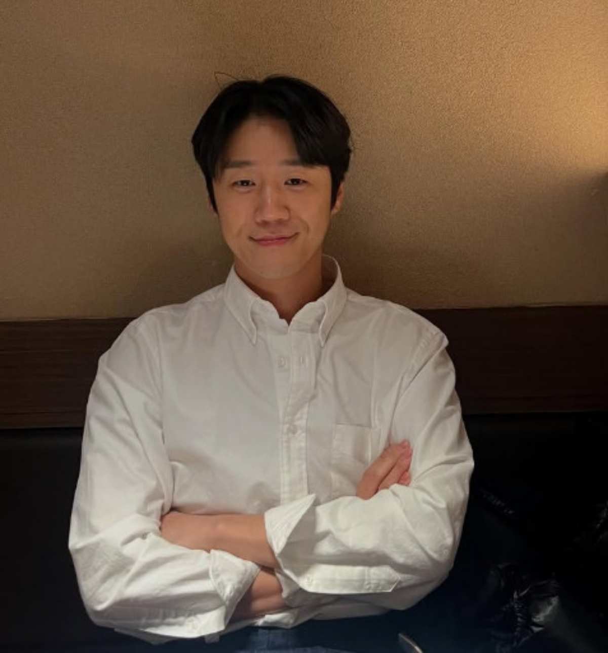 jung joon-won brand reputationman-smiling-crossedArms-whiteShirt.
