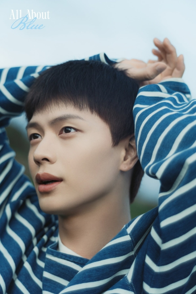 Yook Sung‑jae The Haunted Palace interviewportrait-man-striped-blue.