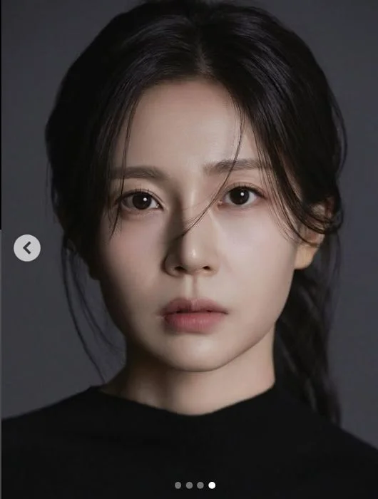 baek jin-hee new profile photoportrait-woman-darkhair-serious.