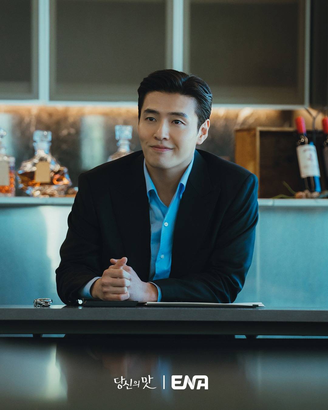 tastefully yours korean dramaman-suit-table-bottles.