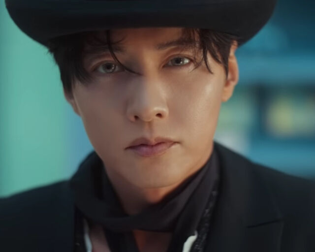 won bin comeback advertisementportrait-hat-scarf-serious.