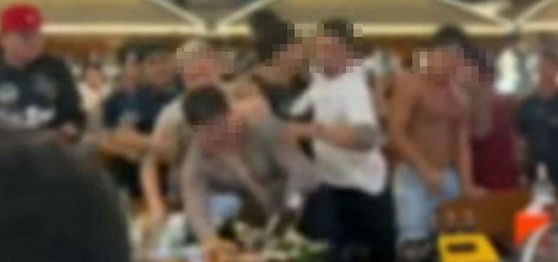 Korean tourists Pattaya brawlfight' 'men' 'crowd' 'blurred.