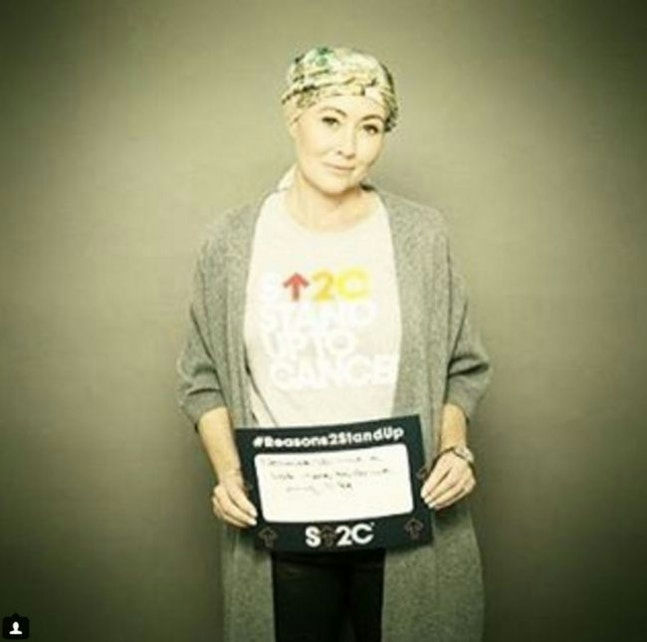 Shannen Doherty death anniversarywoman' 'scarf' 'sign' 'cancer.