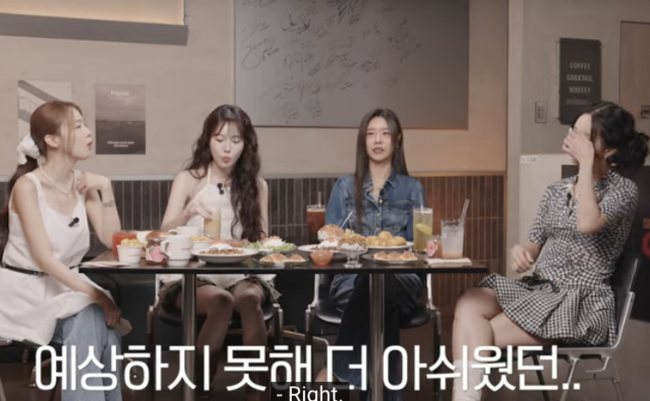 Yura Minah weddingfour-women-food-table-indoors.