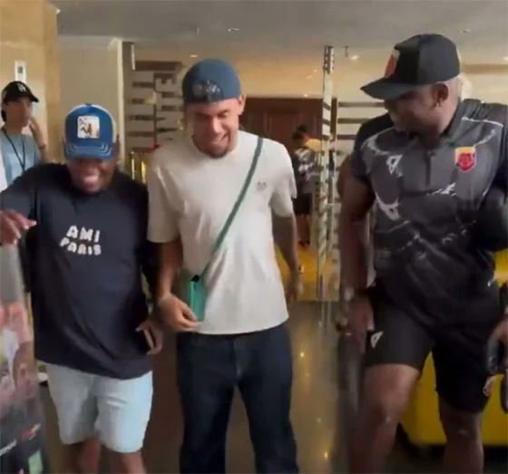 Luis Díaz skips Jota funeralmen-indoor-caps-walking.