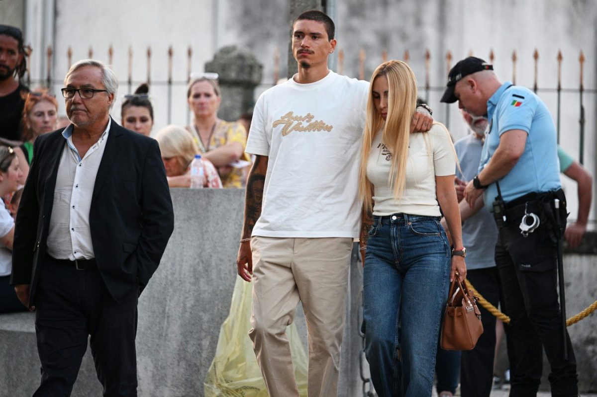 Liverpool Jota contract payoutcouple-police-formality-crowd.