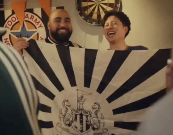 Newcastle Rising Sun controversyfans-NewcastleUnited-celebrating-flag.