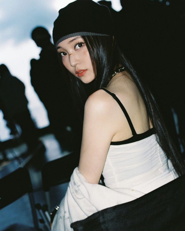 Youngseo K-pop debutwoman-beret-shadows-lowangle.
