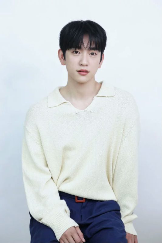Park Jinyoung weight lossman-sweater-portrait-indoors.